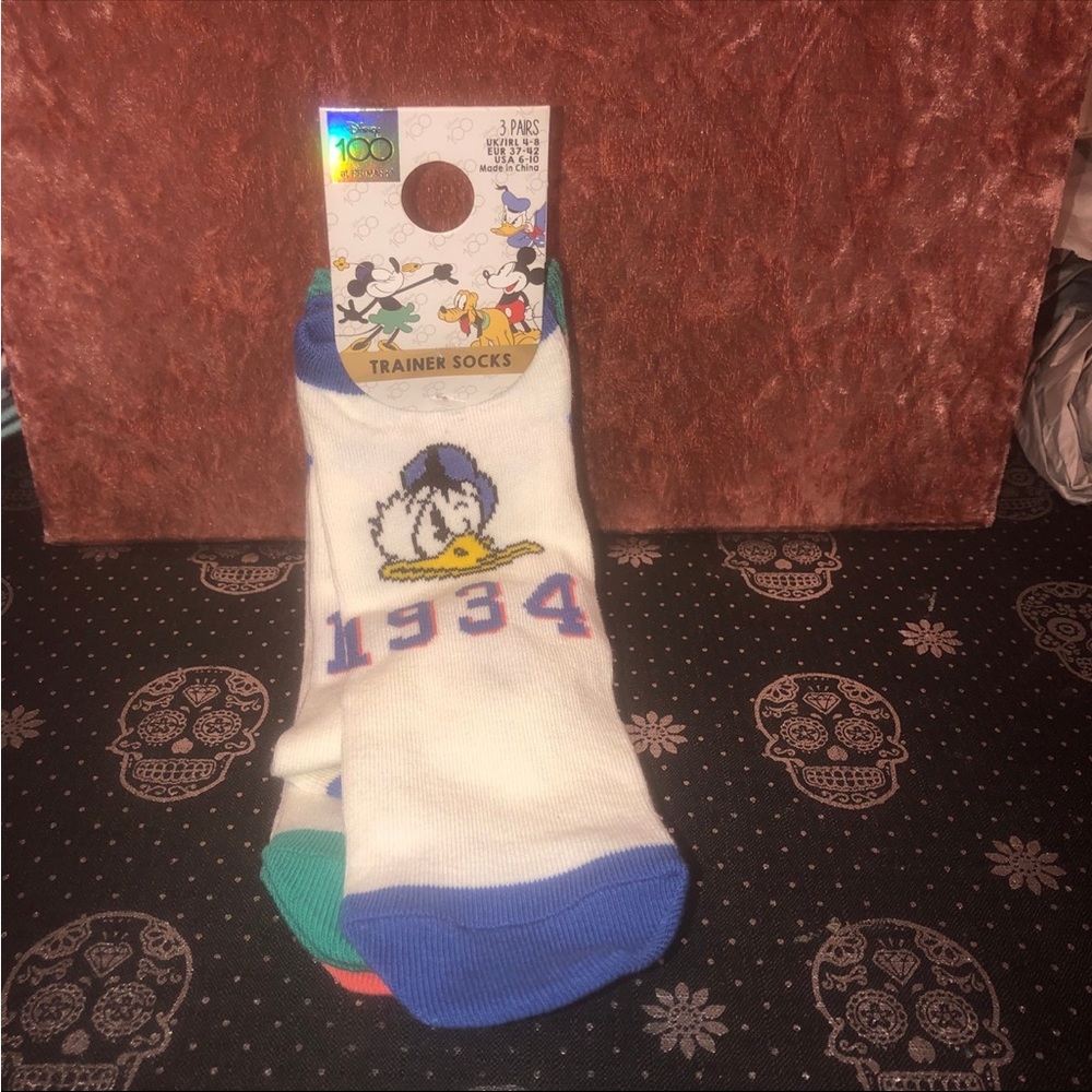 Disney three pack of socks featuring Donald Duck, Pluto and Mickey Mouse
